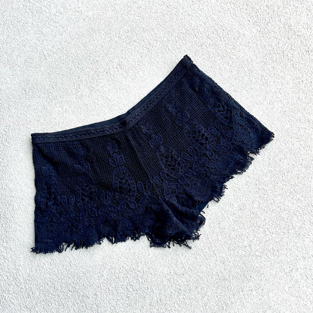 Crochet slip on low waist black shorts